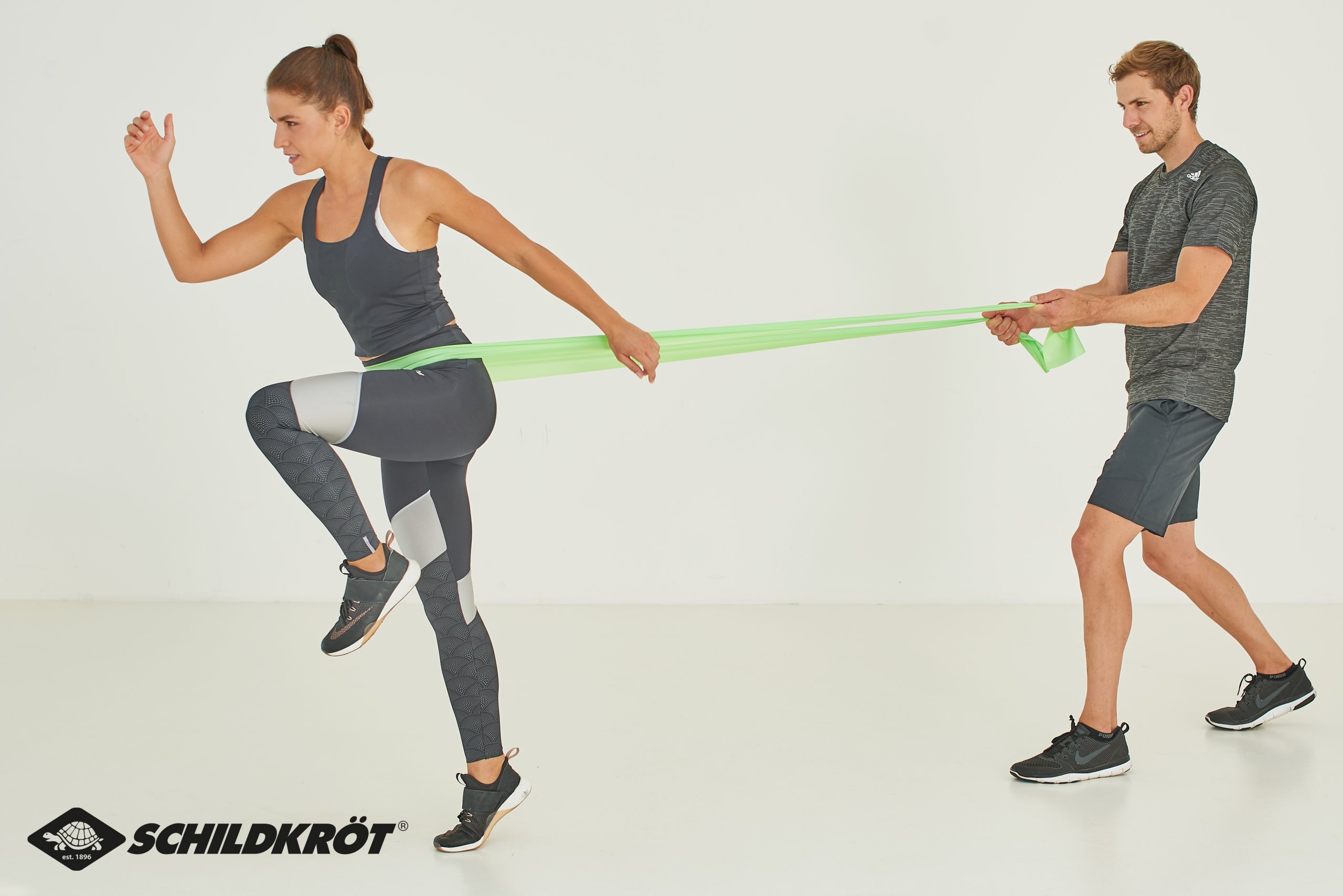 960120_Fitnessbaender_Image_1_Couple_mit_Logo